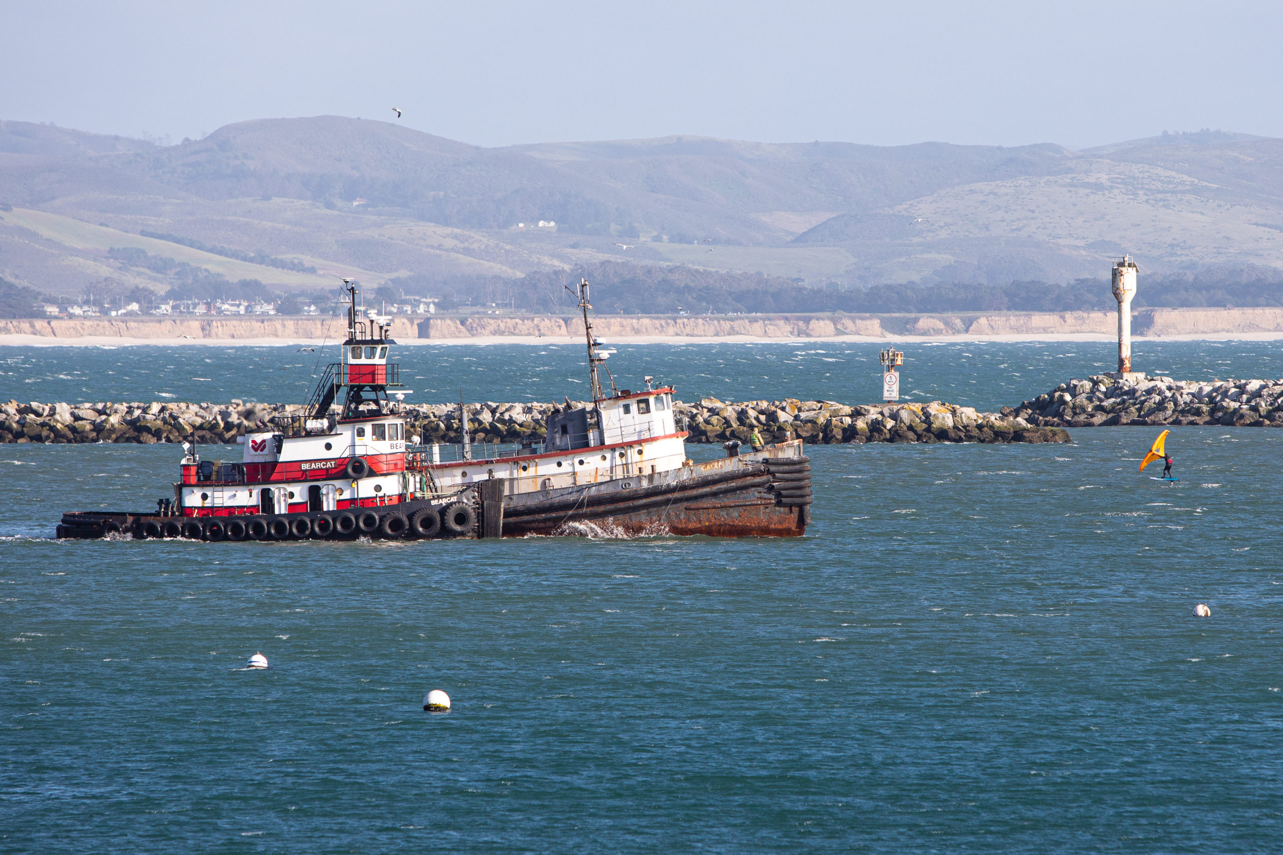 Harbor Tug “Caleb” Parks Illegally, Damaging Fishing Dock at Pillar Point Harbor, Gets Towed to Outer Harbor for Disposition